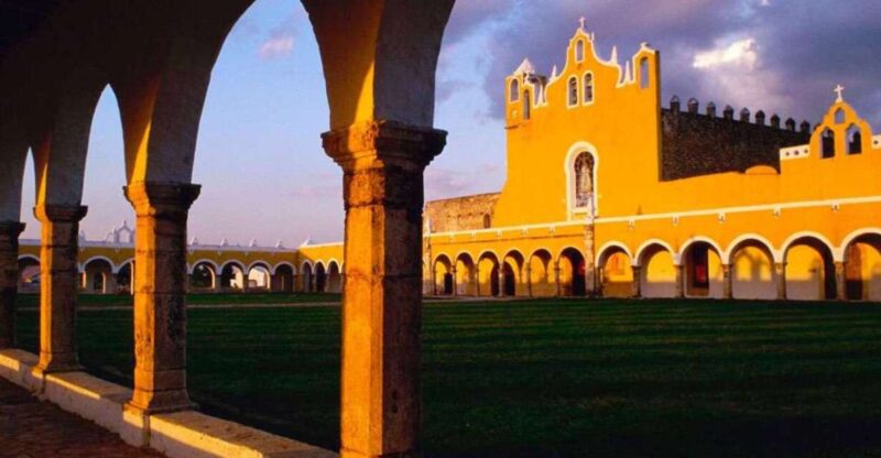 From Merida: Izamal and Valladolid Guide Tour & Yucatan Meal - Cenote Experience