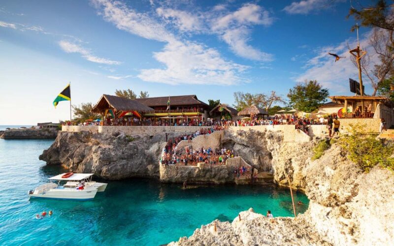 From Montego Bay: Negril Beach & Ricks Cafe Sunset Day Trip - Margaritaville Stop