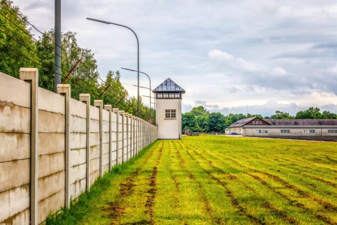 From Munich: Dachau Memorial Site Day Tour - Hearing From Former Prisoners