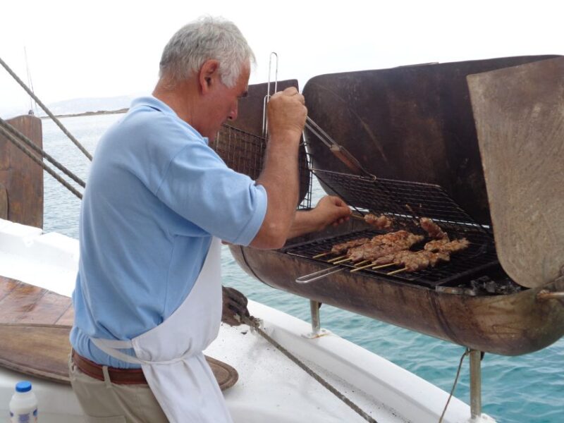 From Mykonos: Cruise to Delos and Rhenia With Lunch - Rhenia Island Beach