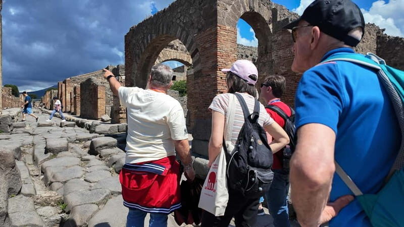 From Naples: Guided Walking Tour of Pompeii With Entrance Ticket and Train - Key Points