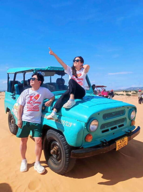 From Nha Trang: Phan Rang Tanyoli Sand Dunes Day Trip - Capturing Photos With Sheep