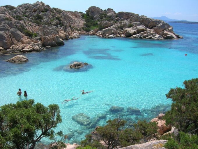 From Olbia: Full-Day Boat Tour to the Maddalena Archipelago - Pickup and Docking Fee