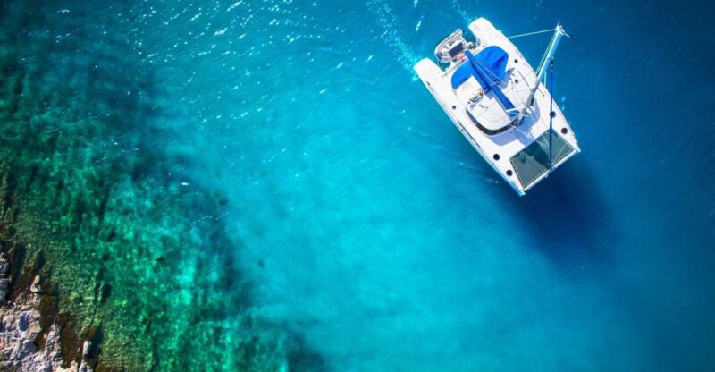 From Ornos: Mykonos Delos Catamaran Cruise With Meal & SUP - Departure and Itinerary