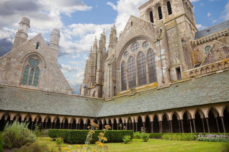 From Paris, Enchanting Mont St Michel Private Tour - Ascent to the Abbey