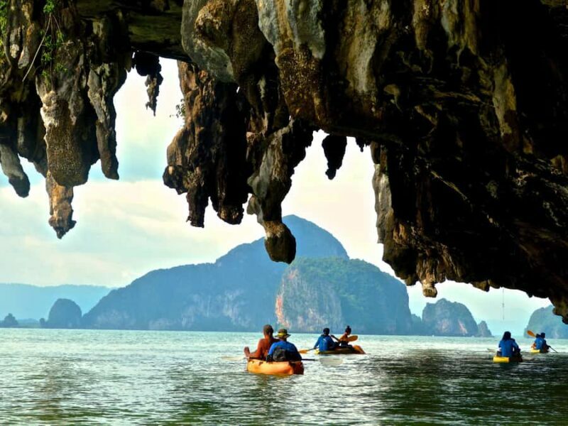 From Phuket: Phang Nga Bay Sunrise & James Bond Island Tour - Sea canoeing and cave exploration