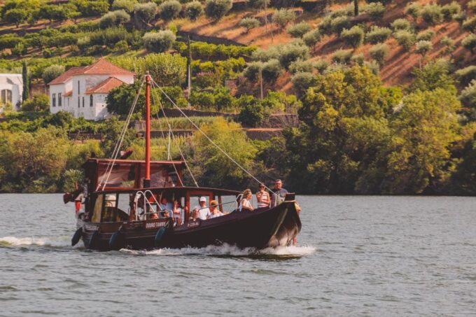 From Pinhão: Douro Valley Rabelo Boat Tour With Audio Guide - Gliding Beneath the Eiffel Bridge