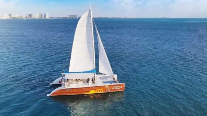 From Playa Del Carmen: Isla Mujeres Catamaran Tour - Snorkeling at El Meco Reef