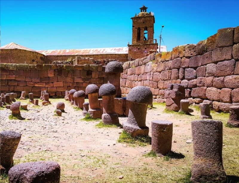 From Puno: Guided Tour of Aramu Muru With Hotel Transfers - Aramu Muru Door