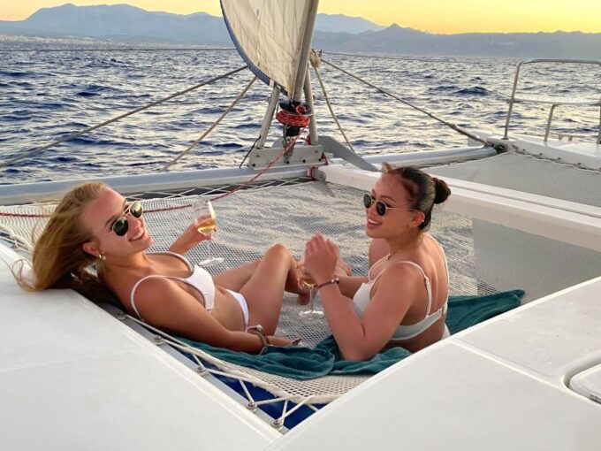From Rethymno: Sunset Catamaran Cruise With Wine and Cheese - Sailing Towards Panormos