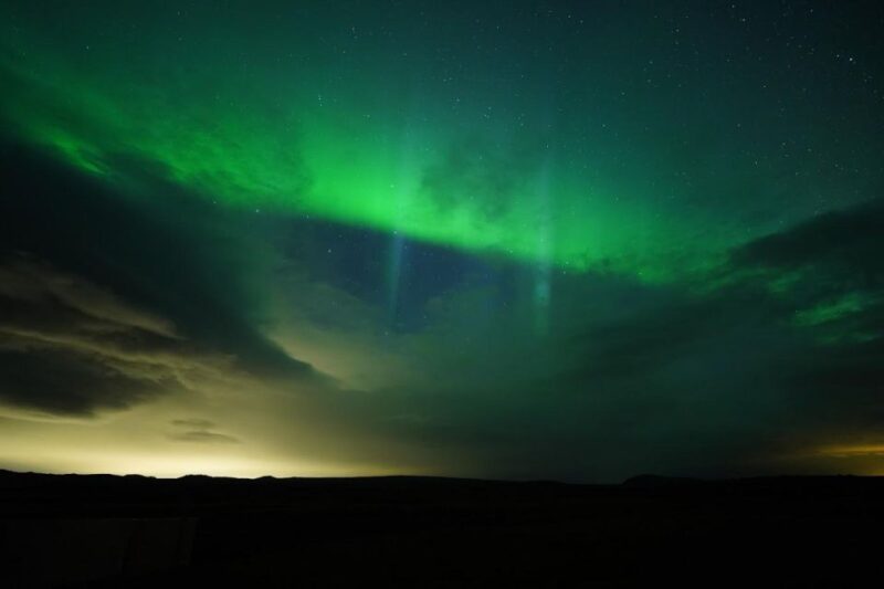 From Reykjavik: Northern Lights Tour With Hot Cocoa & Photos - Cancellation and Reservation
