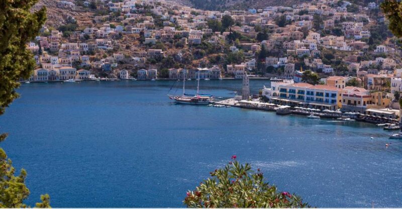 From Rhodes: Full-Day Boat Trip to Symi and Panormiti - Experience Highlights