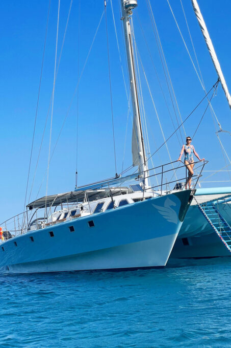 From Rhodes: Half-Day Catamaran Cruise With Swim Stops - Transportation and Meeting Point