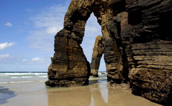 From Santiago: Tour to Cathedral Beach, Asturias, and Pancha - Transportation and Languages