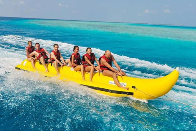 From Sharm: Parasailing, Glass Boat, Watersports, and Lunch - Scenic Photo Stop