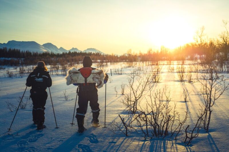 From Tromsø: Guided Husky Snowshoe Hike and Husky Camp Visit - Gear for the Arctic Conditions