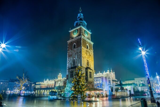 From Warsaw: Auschwitz and Krakow Low Cost Tour With Pickup - Pricing and Duration