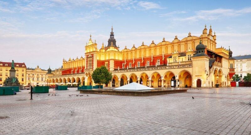From Warsaw: Guided Tour to Auschwitz-Birkenau and Krakow - Train Journey and Transfers