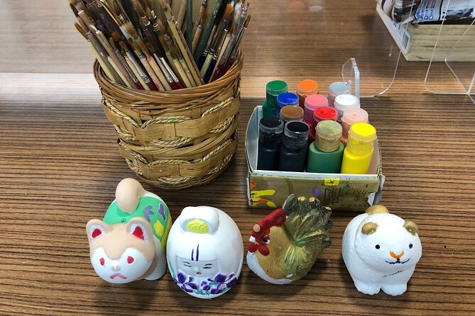 Fukuoka Open Top Bus and Hakata Doll Painting Experience With Guide - Inclusions and Meeting Point