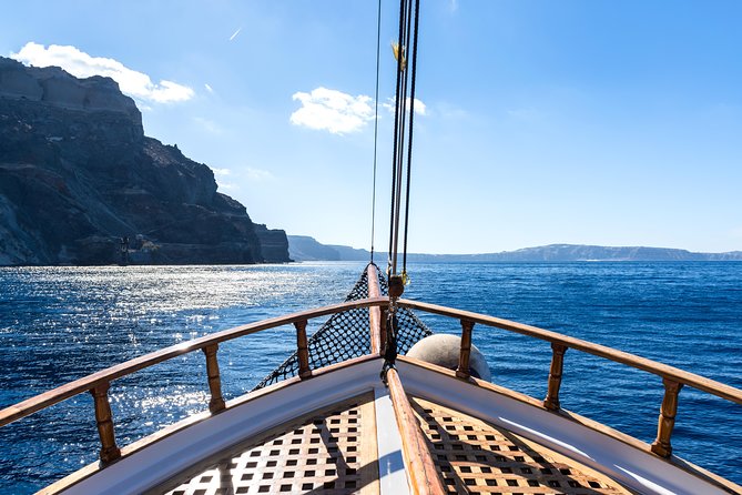 Full Day Boat Tour to Caldera Islands & Sunset in Oia by Bus - Guide Proficiency Highlights