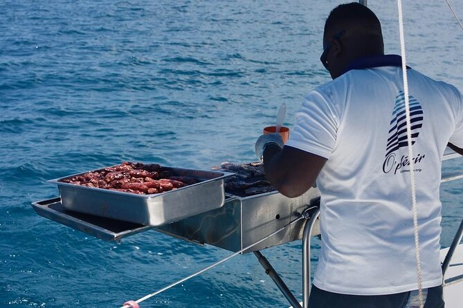 Full Day Catamaran Cruise on Shared Basis to Bénitiers Island - Duration and Return Location