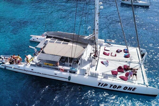 Full-Day Catamaran Cruise With Lunch in Island of Malta - Inclusions and Amenities