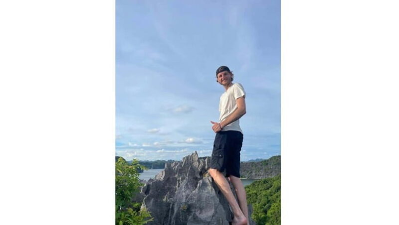 Full Day Cliff Jumping With Kayaking and Viet Hai Village - Relaxing Boat Cruise and Sunset Viewing