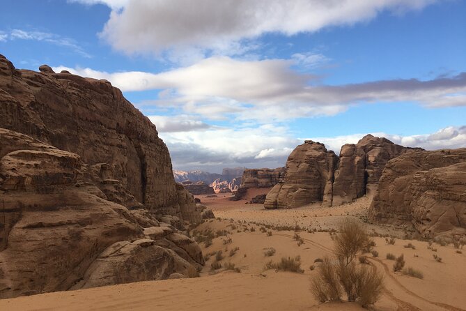 Full-Day Desert Highlights Wadi Rum Jeep Tour - Bottled Water and Refreshments