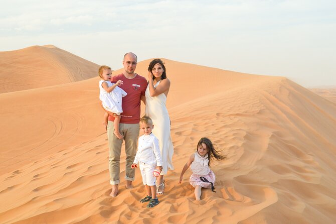 Full-Day Guided Red Dunes Desert Tour in Dubai With Camel Ride - Sandboarding Fun