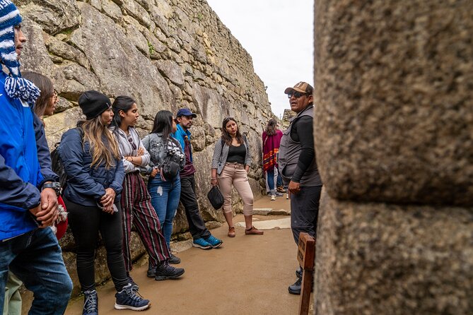 Full Day Guided Tour to Machu Picchu Transportation Included - Inclusions