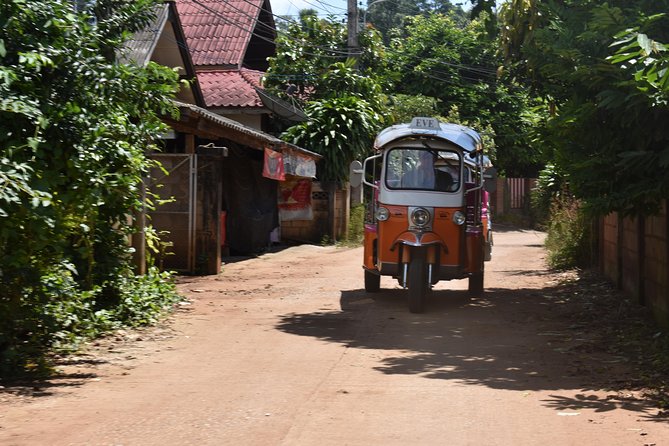 Full-Day Guided Tuk Tuk Chiang Mai Adventure and Rafting - Visiting a Remote Temple