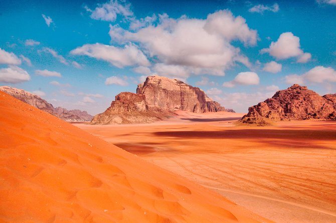 Full-Day Jeep Tour: Wadi Rum Highlights and Night Under the Stars - Natural Rock Bridge and Lawrences Spring
