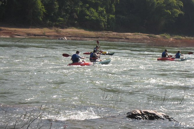 FULL DAY – Kuang Si Waterfall, Kayak on the Nam Ou / Mekong River, Pak Ou Caves - Kayaking on the Rivers
