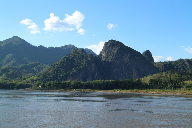 FULL DAY – Kuang Si Waterfall, Kayak on the Nam Ou / Mekong River, Pak Ou Caves - Exploring Pak Ou Caves