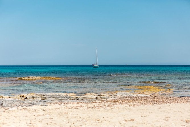Full-Day Private Ibiza and Formentera Charter Cruise - Swimming, Snorkeling, and Paddle Boarding