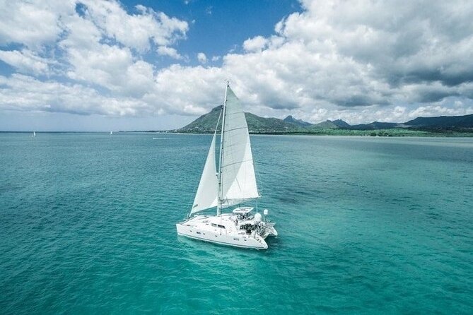 Full Day Shared Tour Catamaran to Ile Aux Cerfs - Pickup and Transportation