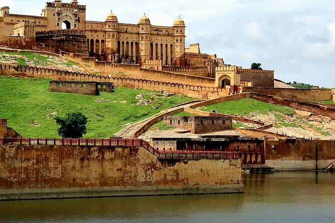 Full Day Sightseeing Jaipur Tour by Car With Guide Include Lunch - The Guide and Food Experience