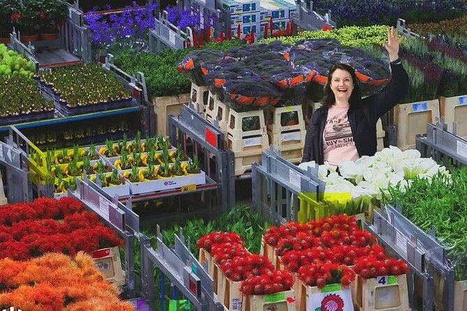 Full-Day Trip From Amsterdam to Keukenhof, Zaanse Schans + Cruise - Zaanse Schans Windmill Village