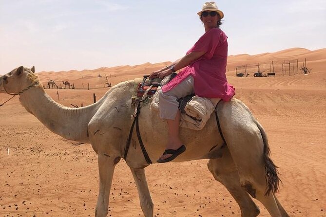 Full-Day Wahiba Desert and Wadi Bani Khalid Group Tour - Sinkhole and Bedouin Family Visit