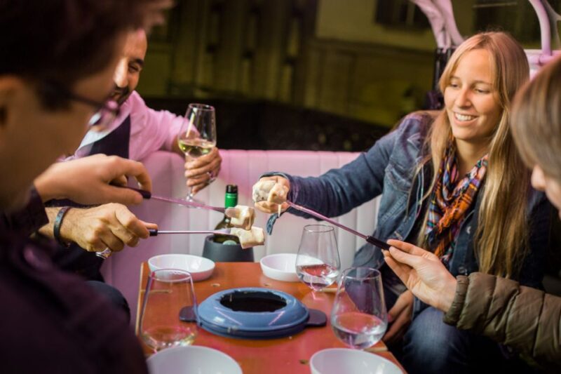 Geneva: Tour With Fondue and Wine in Tuktuk - Key Points