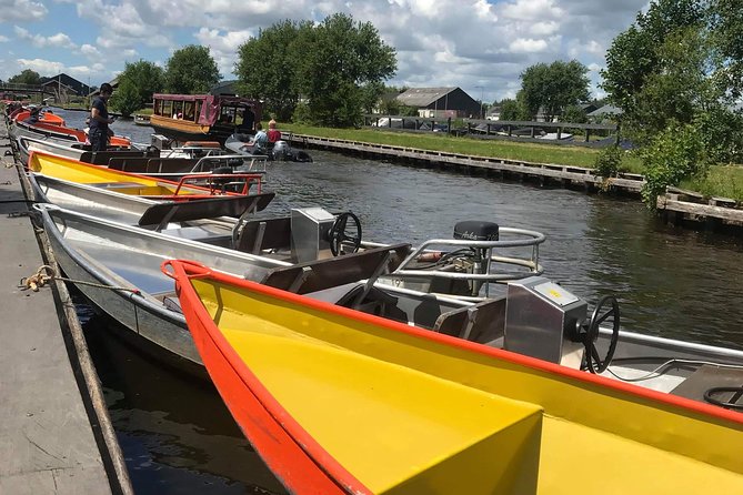 Giethoorn and Zaanse Schans Windmills Day Trip From Amsterdam - Confirmation and Accessibility