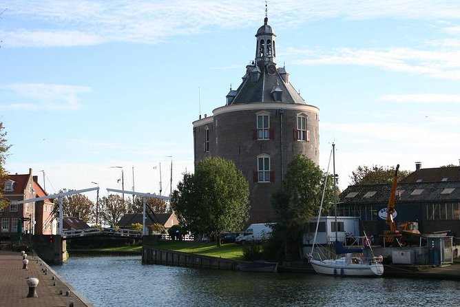 Giethoorn Private Tour From Amsterdam With Dutch Dike Sightseeing - Luxury Transportation in Jaguar