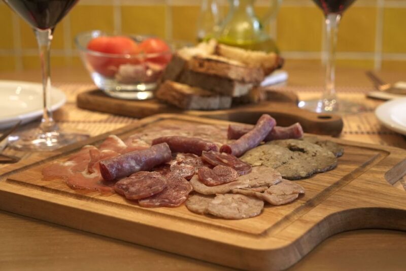 Girona: History and Gastronomy Small Group With Tastings - Crossing the Onyar River Bridges