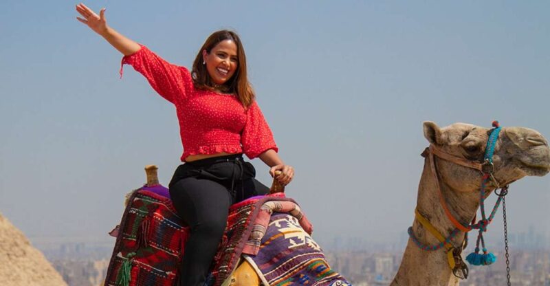 Giza: Pyramids at Sunset Guided Camel Tour - Guided Experience