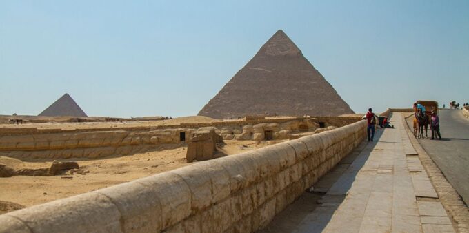 Giza: Pyramids at Sunset Guided Camel Tour - Group Size and Transportation