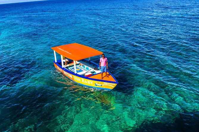 Glass Bottom Boat Ride/Snorkeling/Booby Cay Island From Negril - Relaxing on the White Sand Beach