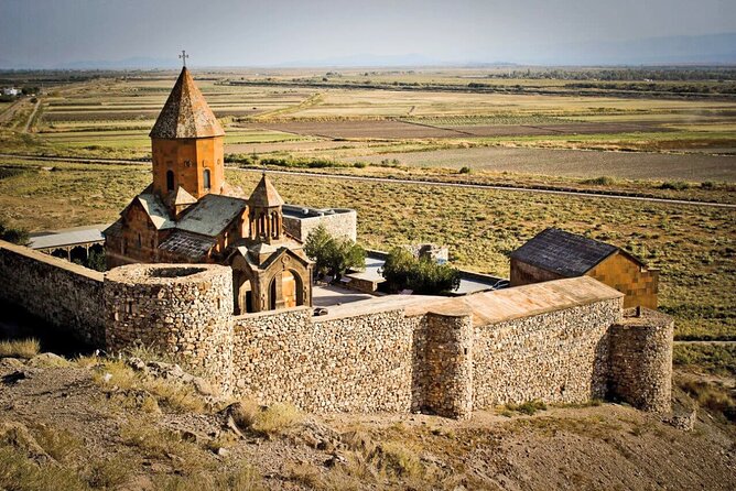 Group Tour: Khor Virap, Garni Temple, Geghard, Lavash Baking - Visiting Geghard Monastery
