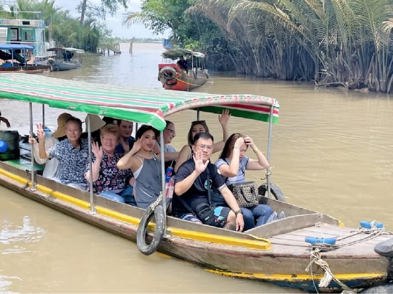 Group Tour to Cu Chi Tunnels and Mekong Delta 1 Day - Local Cuisine and Music
