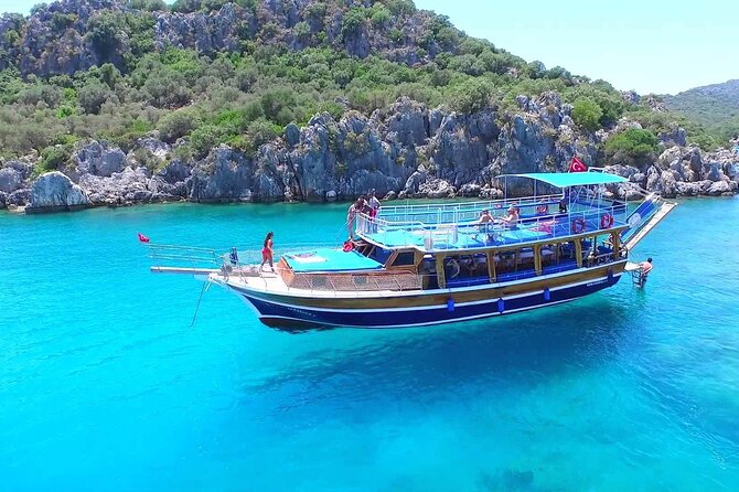Guided Porto Genoese Boat Trip With Mud Bath - Key Points