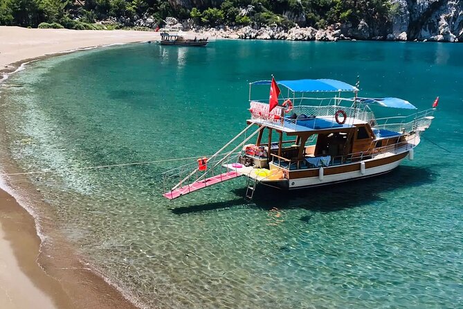 Guided Porto Genoese Boat Trip With Mud Bath - Onboard Dining Experience